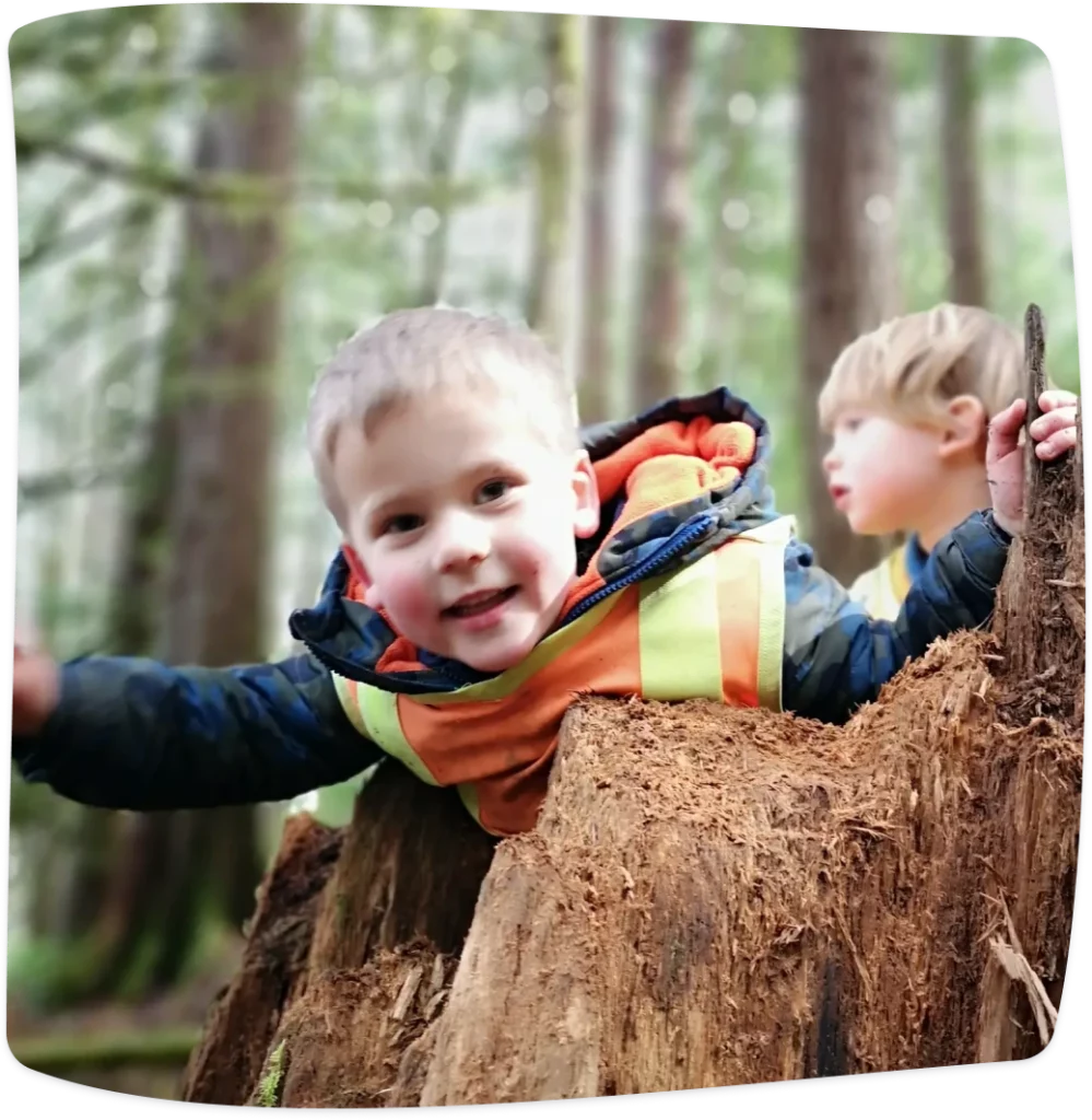 kid playing in forest